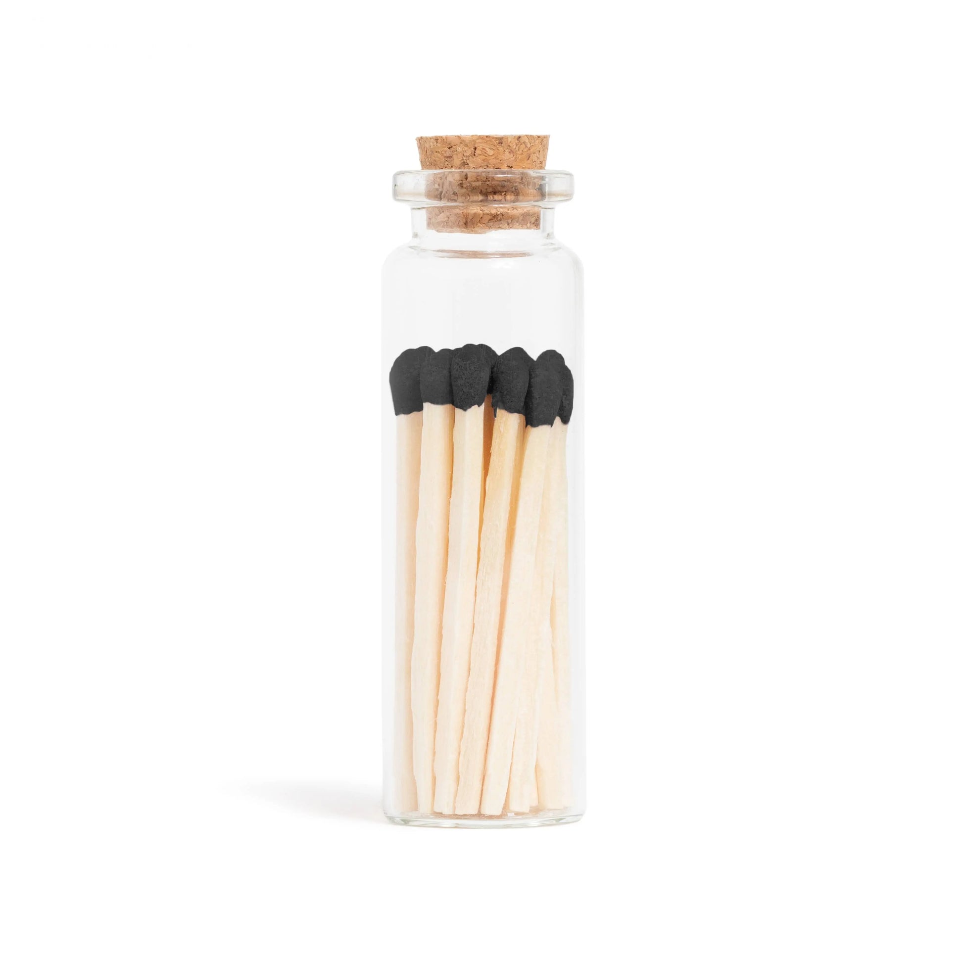 Black Matches in Small Corked Vial Enlighten the Occasion